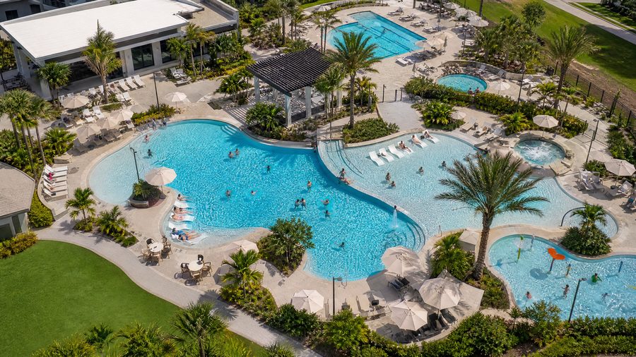 Resort-style pool complex with landscaping aerial view